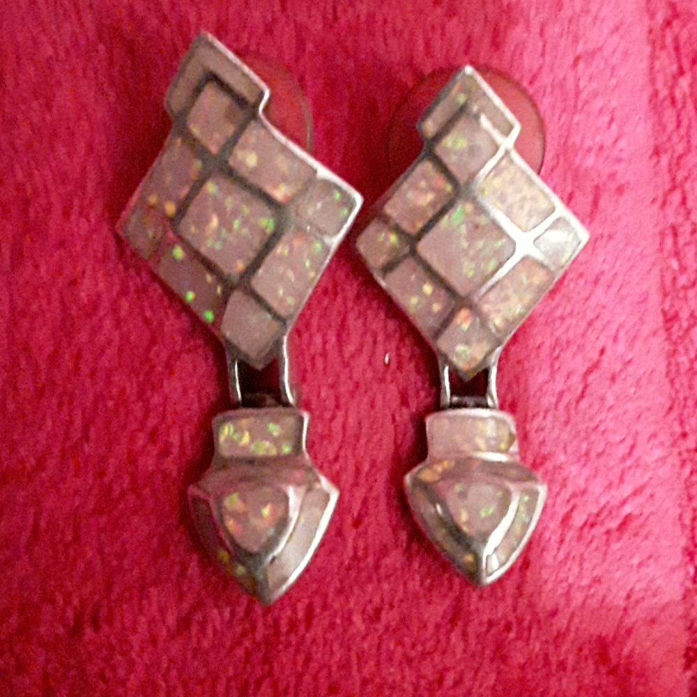 David Freeland Jr (opal earrings)